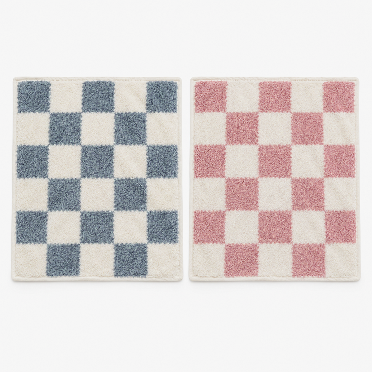 Calevina checkered knit throw blanket in blue and white and pink and white, laid open side by side
