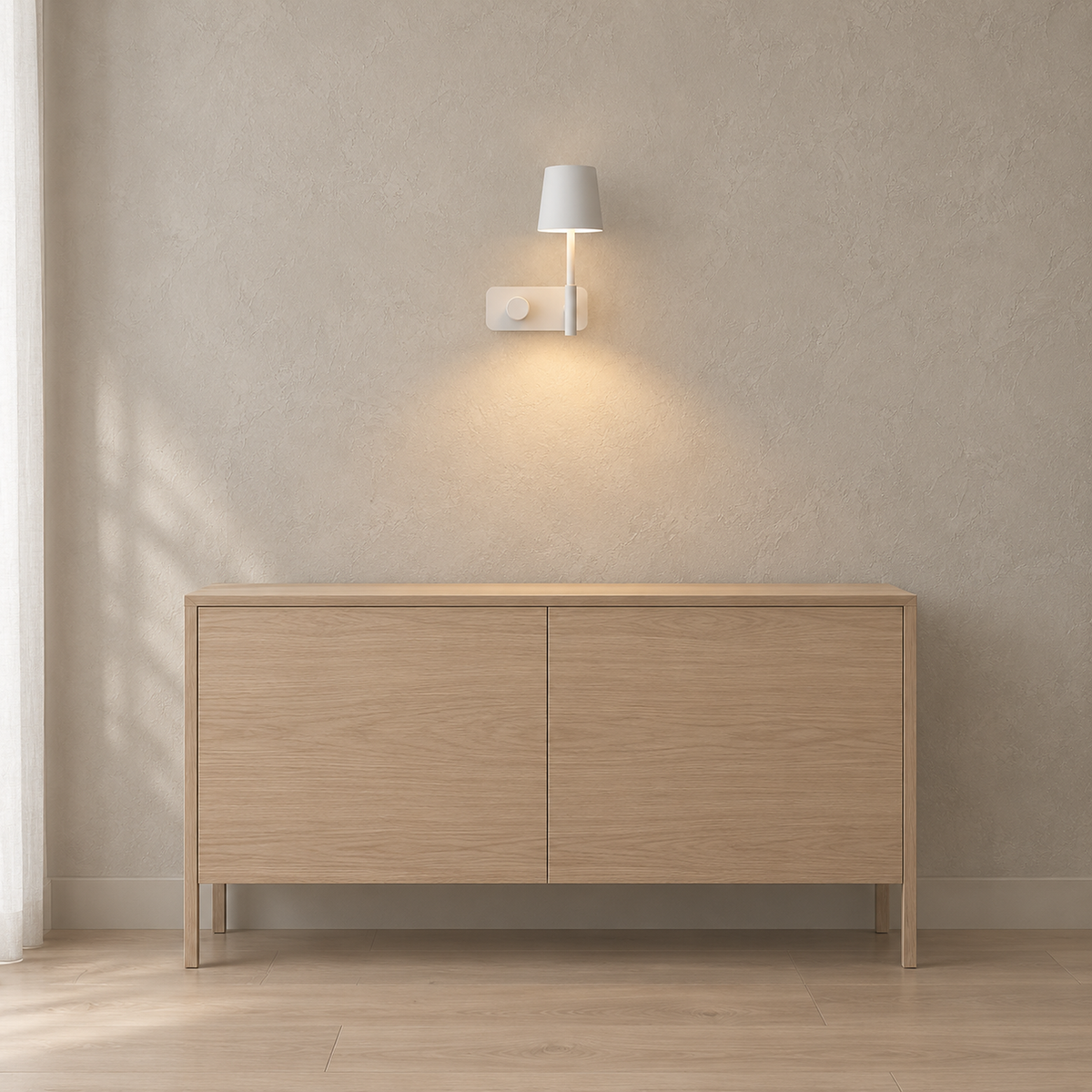 Cavolire white wall sconce casting a warm accent light along a hallway above a console table