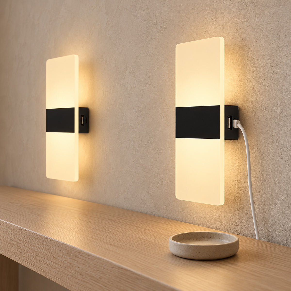 Ciloreva black rechargeable wall sconce plugged in to charge in a dressing room