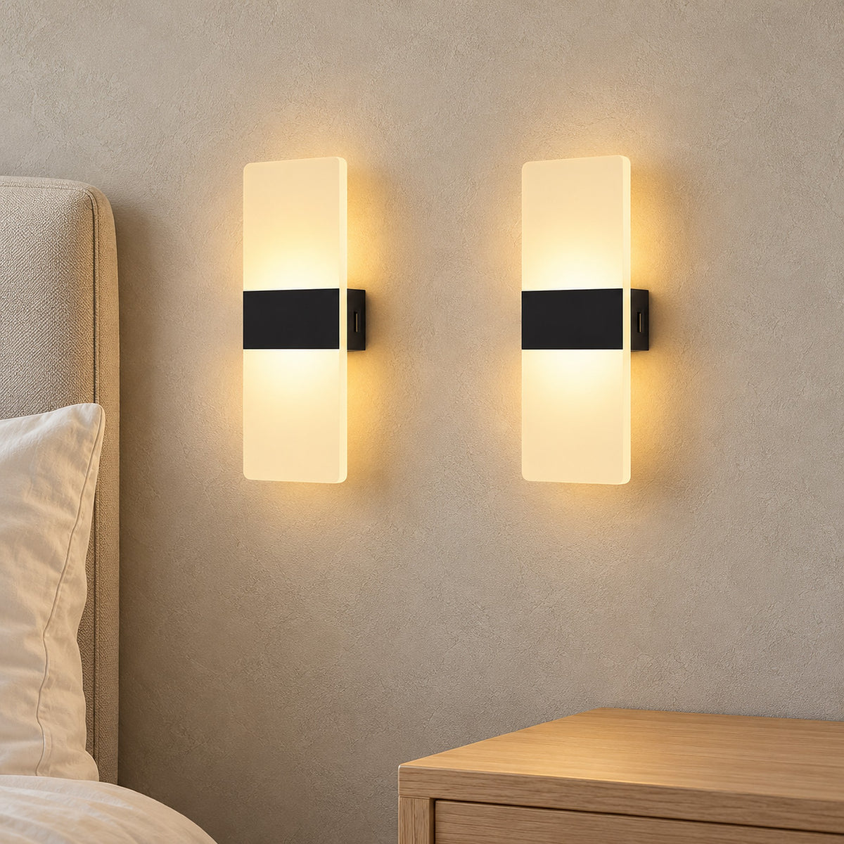Ciloreva black wall lamp pair glowing beside a clear nightstand in a guest bedroom