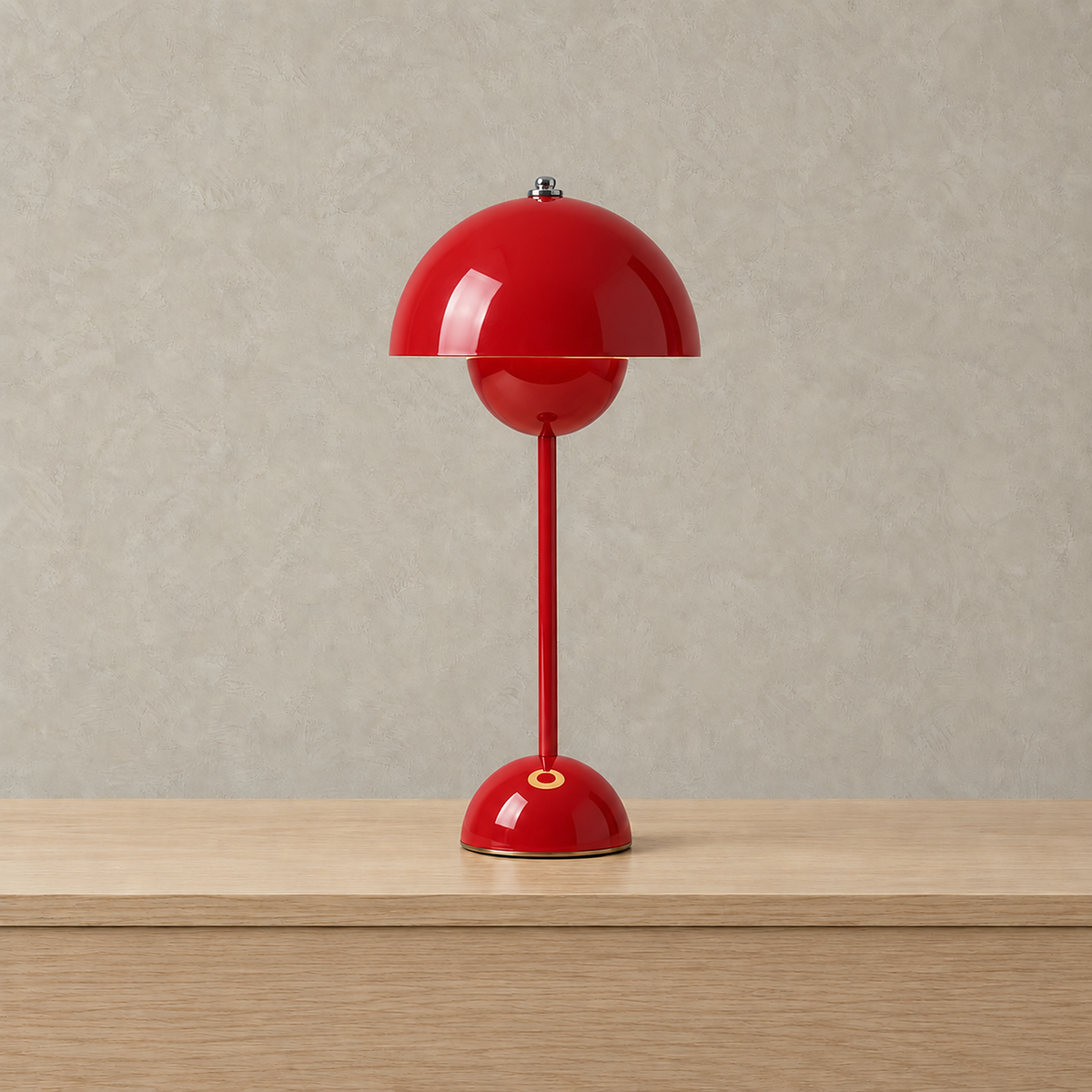 Coremila red table lamp standing unlit on its own against a plain backdrop #color_red