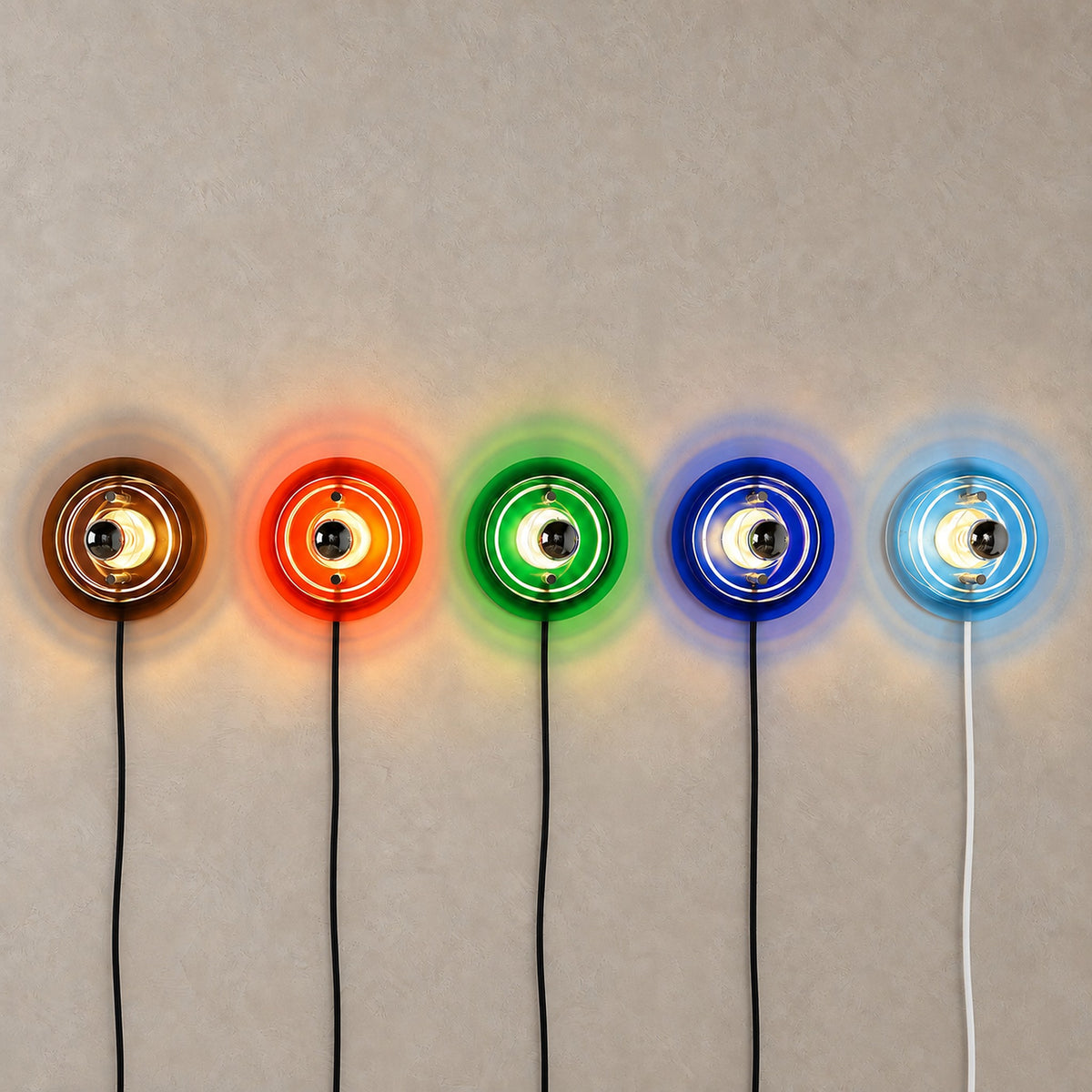 Elsarvo wall sconces lit in brown, orange, green, dark blue and light blue