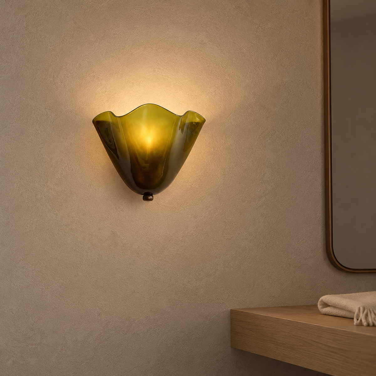 Ilsaren green wall lamp lit beside a bedroom dressing mirror in soft midday light