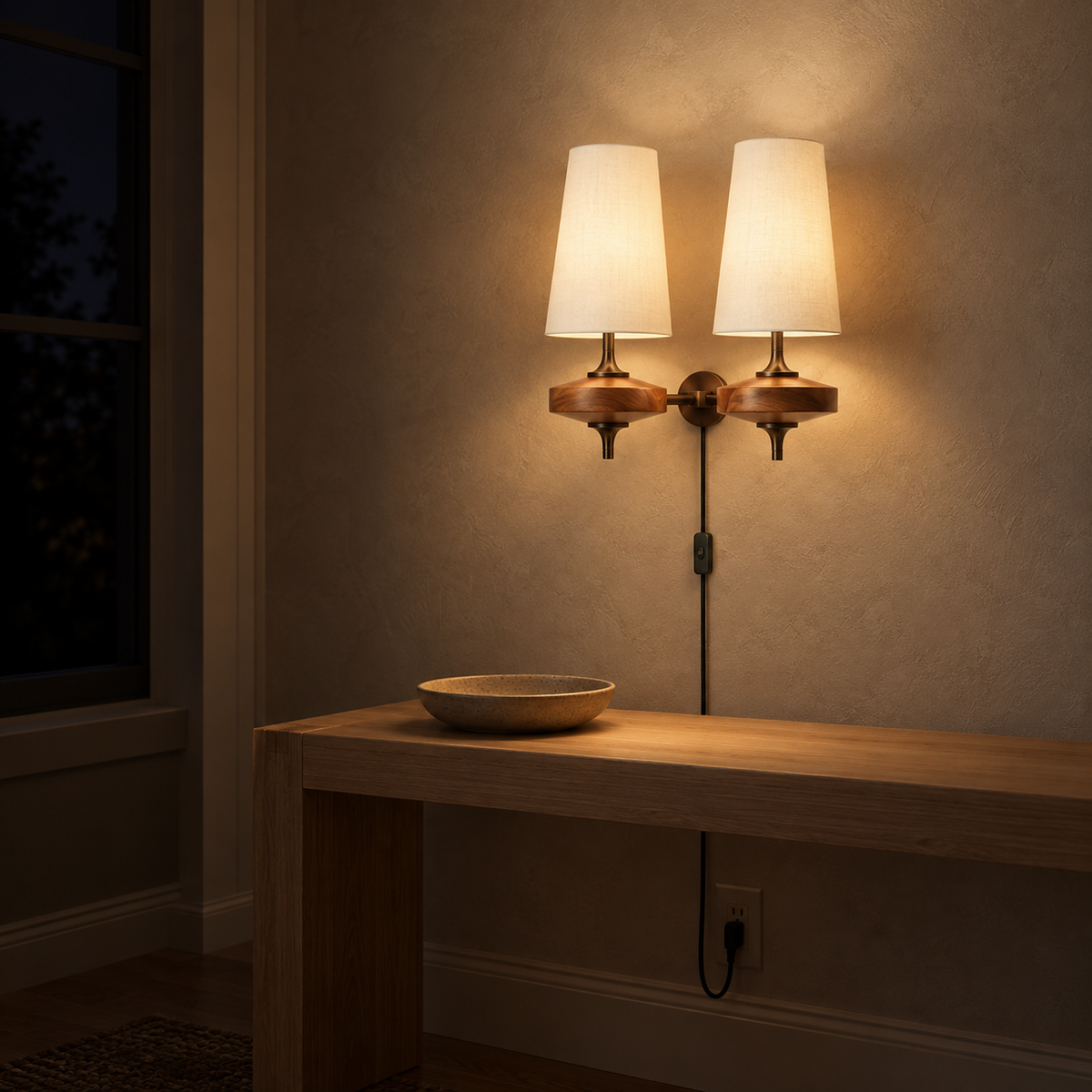 Larevio white plug in wall sconce casting soft warm light over a console at night #color_white