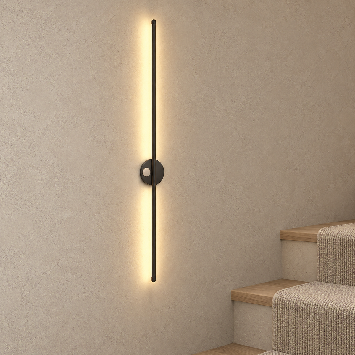 Lariveno black cordless wall lamp glowing beside a staircase in daylight