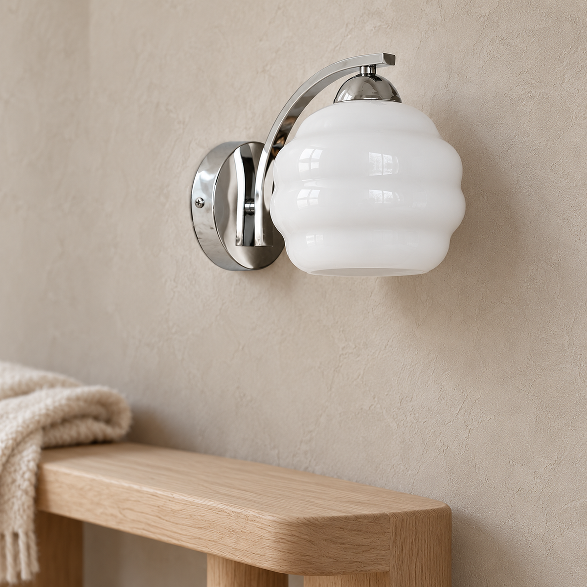 Lasemiro white led wall sconce detail showing the glass shade and curved plated arm