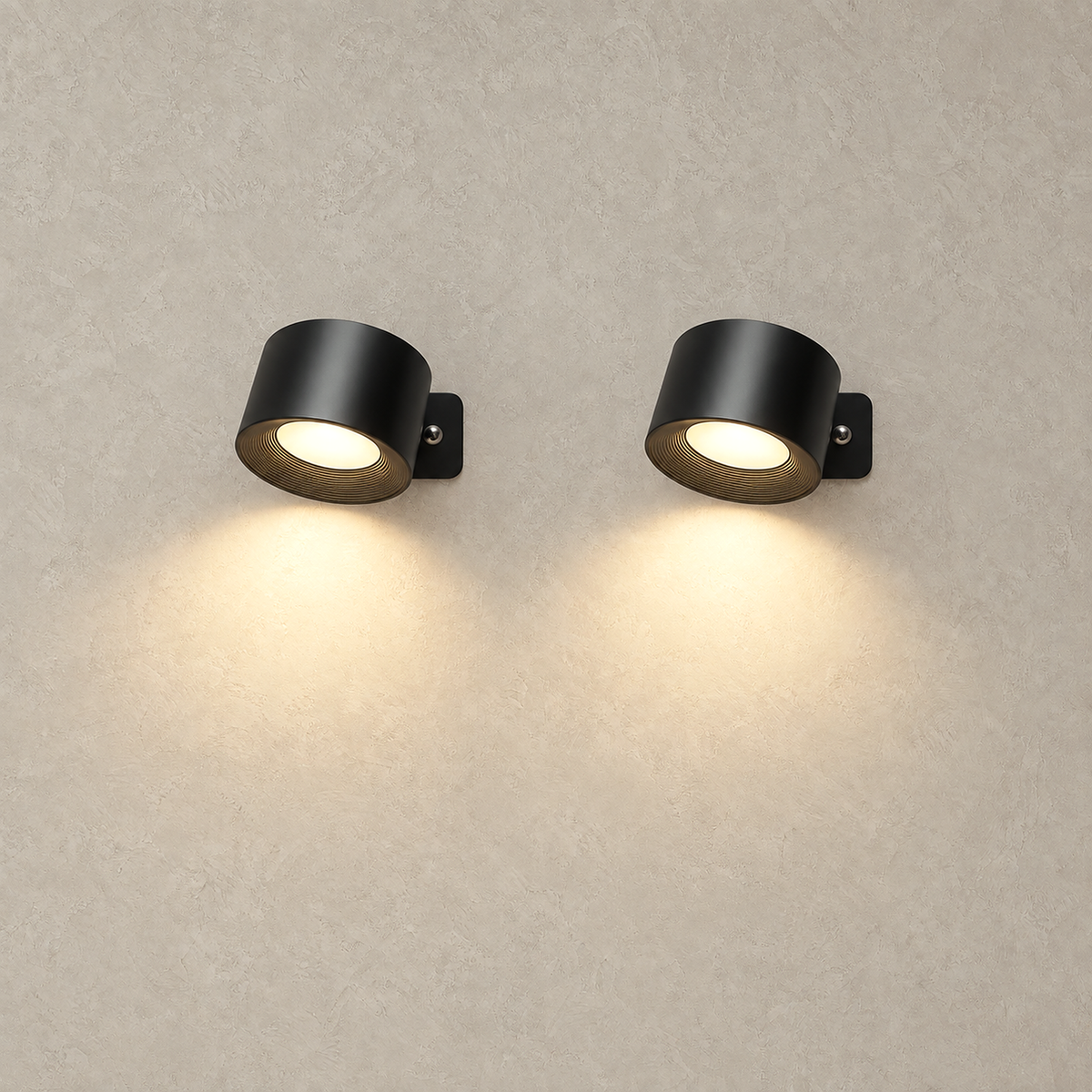 Lasirel black rechargeable wall sconce set of 2 lit side by side on a plain plate
