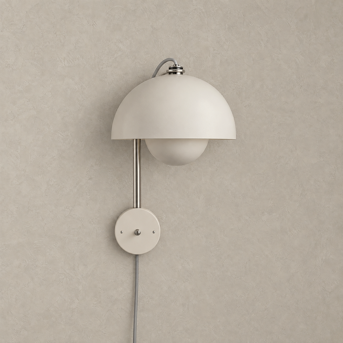 Lasorme cream plug in led wall sconce with a painted metal dome shade and round wall plate, shown unlit