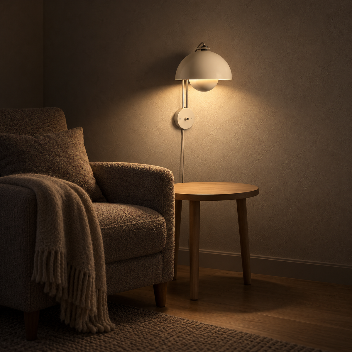 Lasorme cream wall light glowing warm white on living room plaster after dark