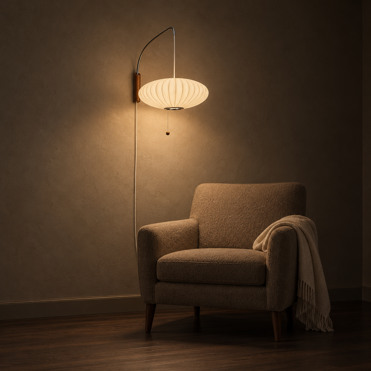 Lavomel chrome and walnut tone plug in wall light in warm white above a living room armchair at night