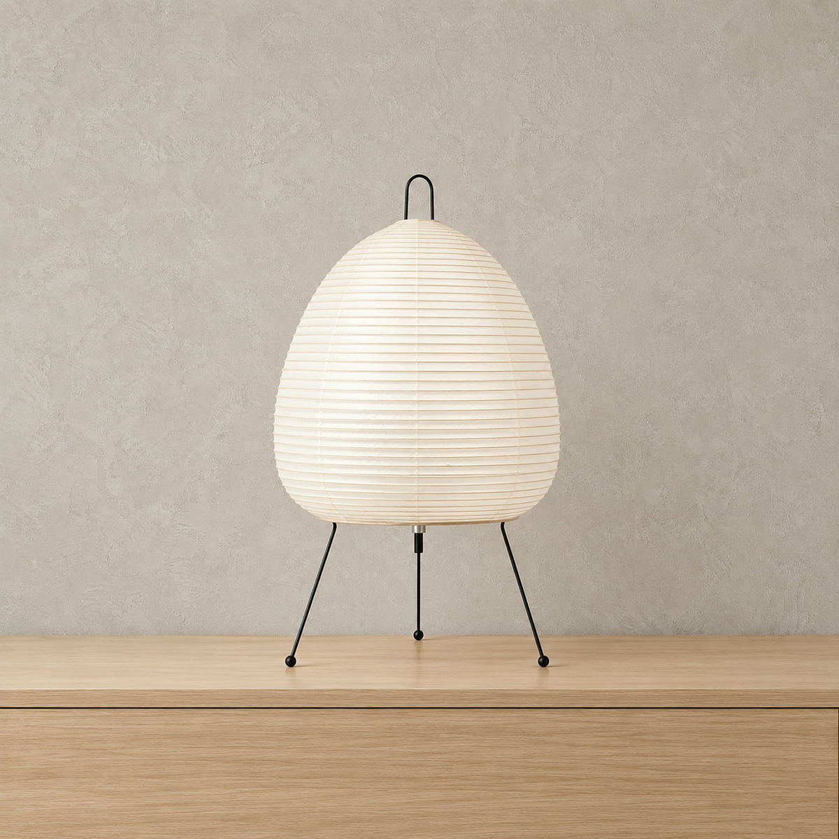 Lirveno white rice paper table lamp with a handmade shade on an iron tripod, shown unlit