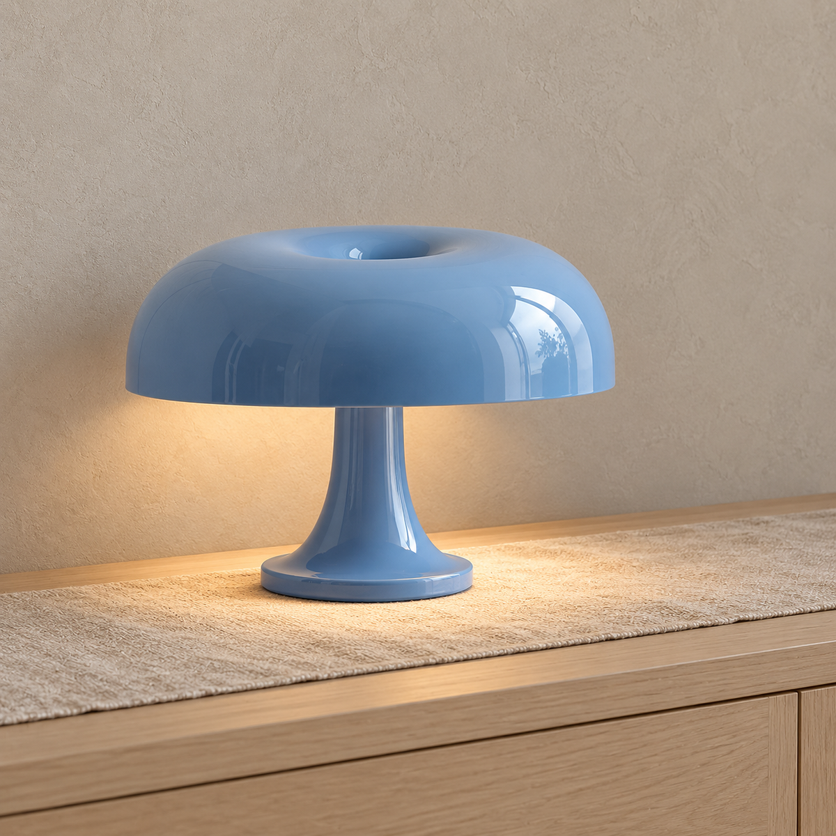 Lisamor blue mushroom table lamp glowing on an entryway console in daylight