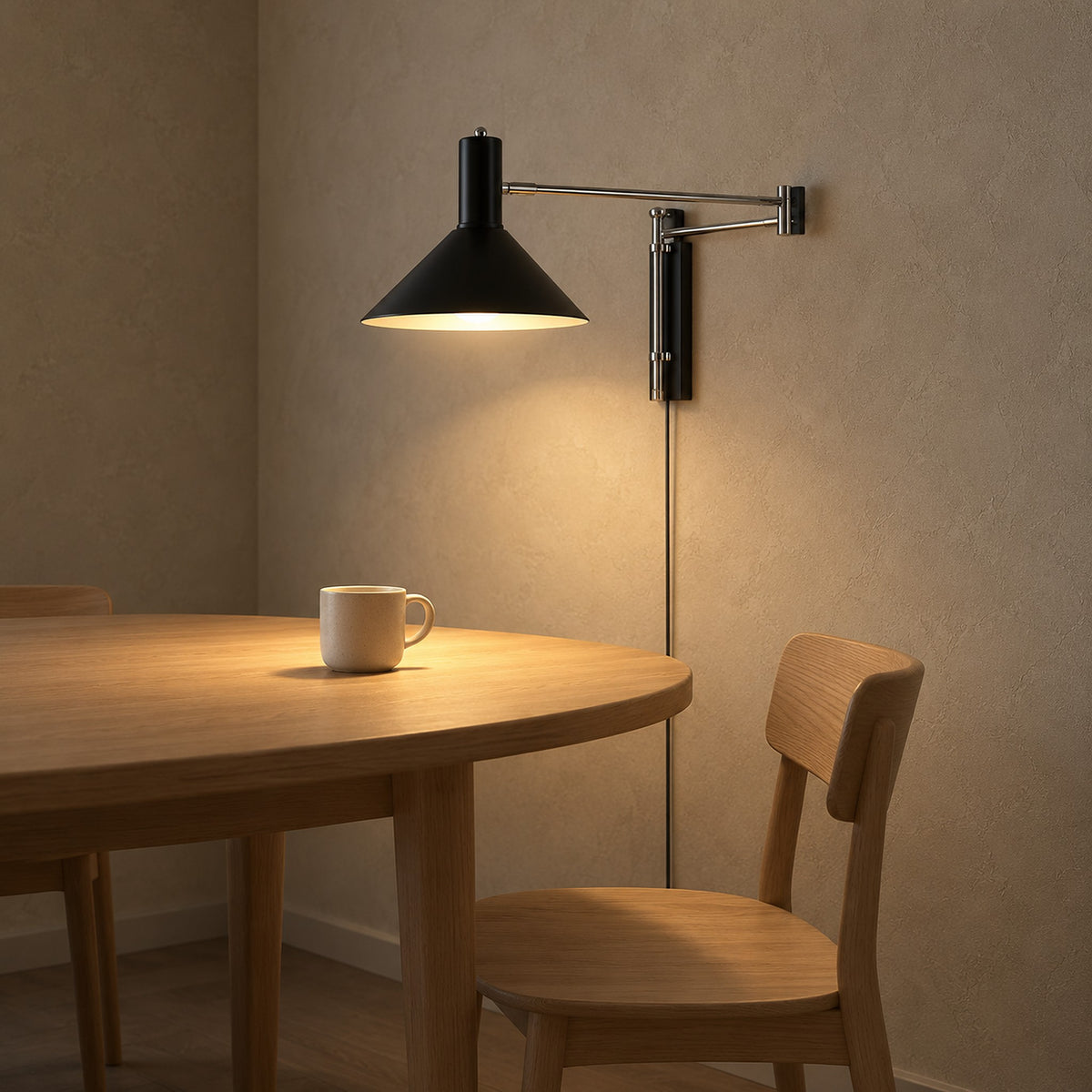 Lomaresi black plug in wall sconce on a swing arm lighting the table in a dining nook
