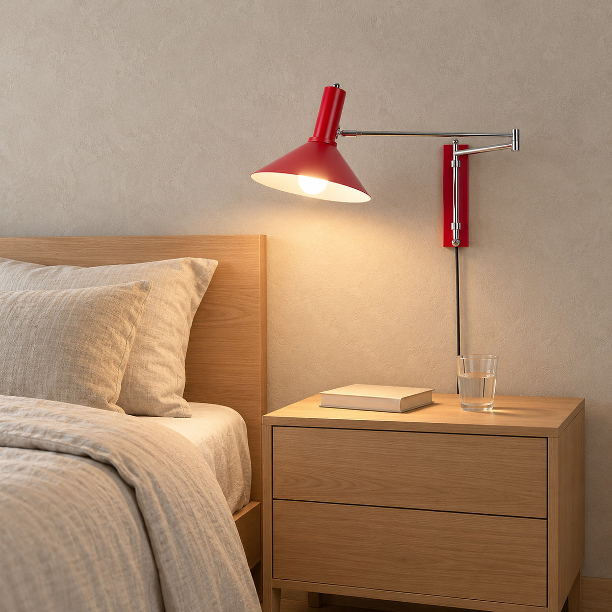 Lomaresi red plug in wall lamp adding color next to the guest bed in a sleeping alcove #color_red