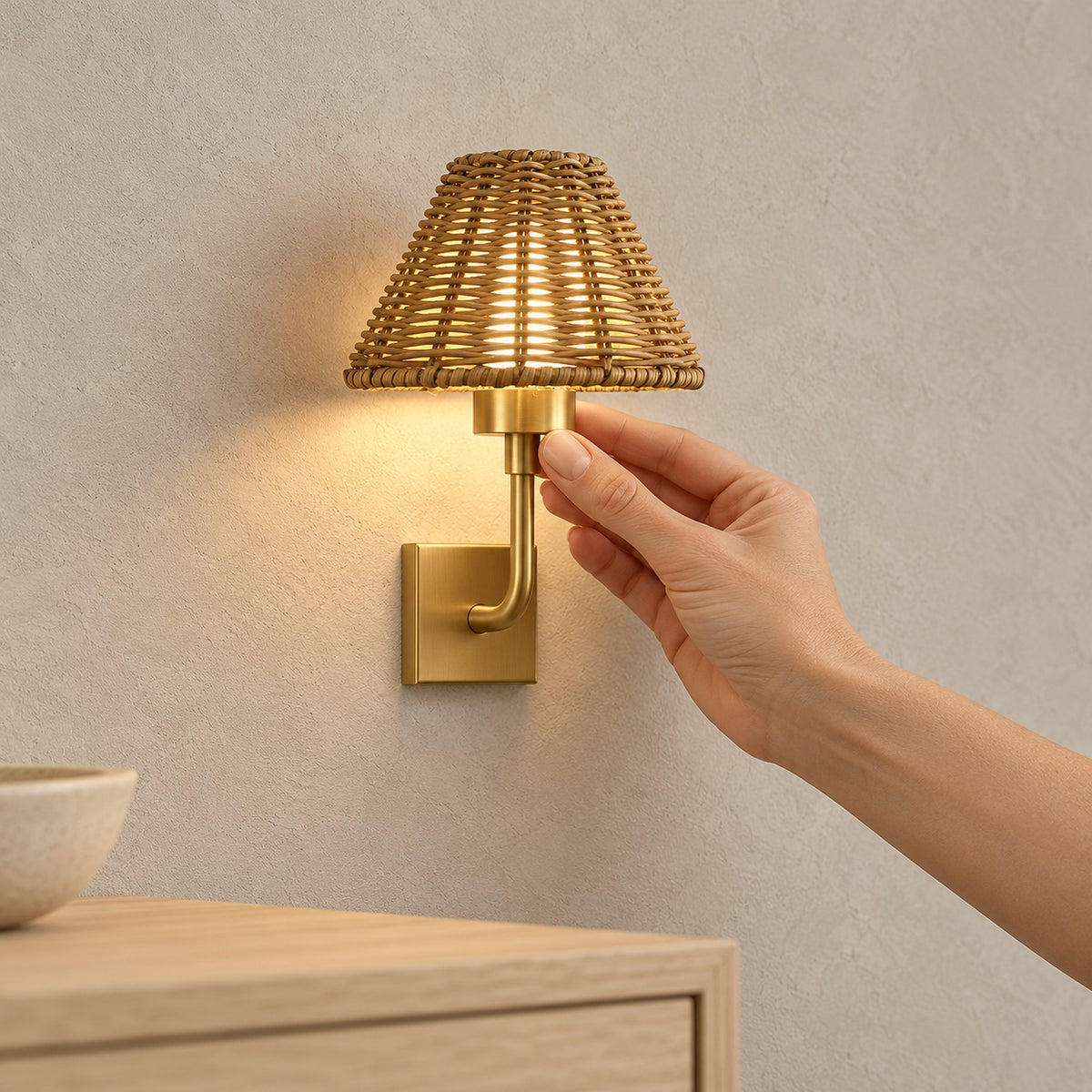 Lomarvi gold cordless wall lamp showing the square wall plate and curved iron arm