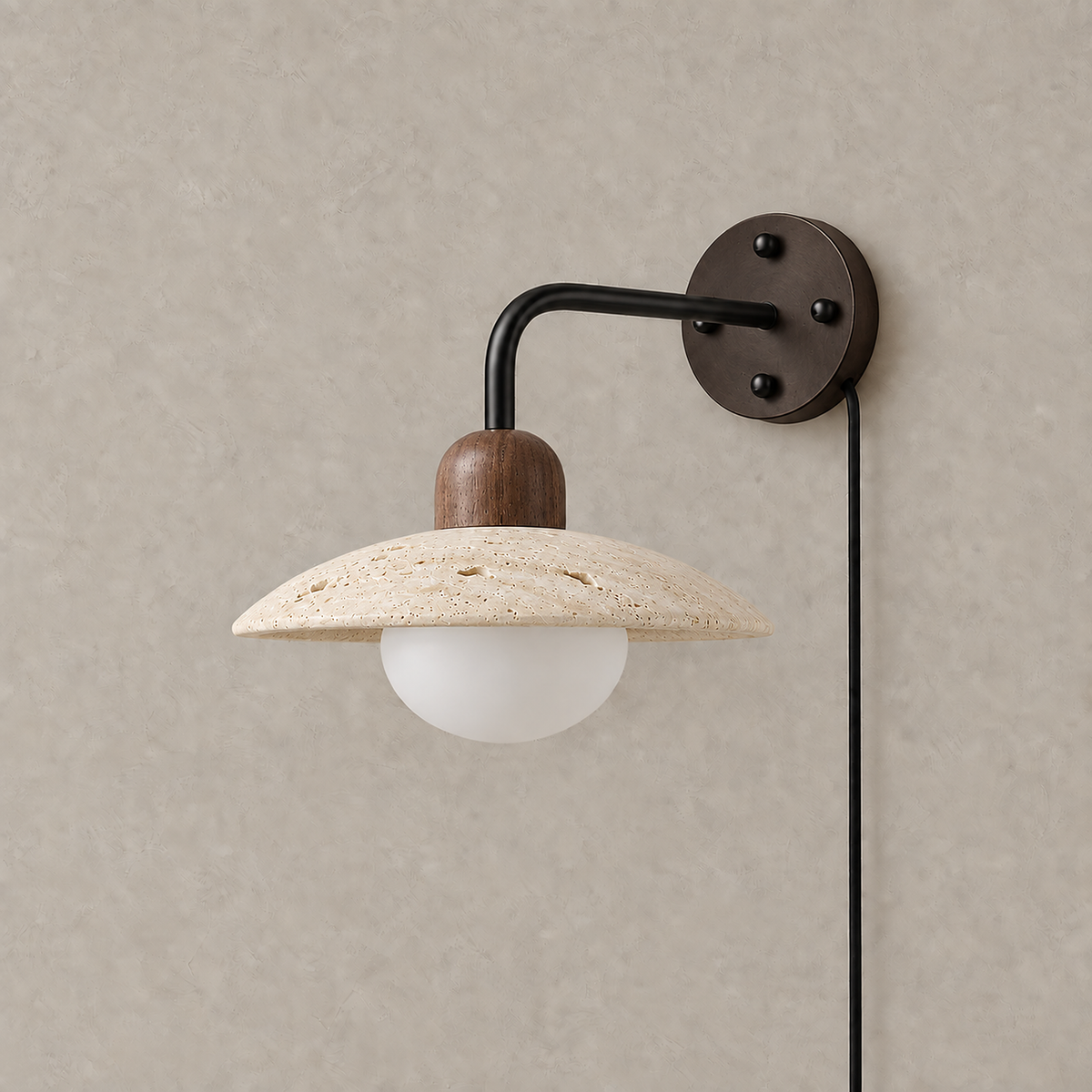 Lomiseta black and yellow travertine plug in wall sconce unlit on a plain plaster wall #color_black & yellow travertine