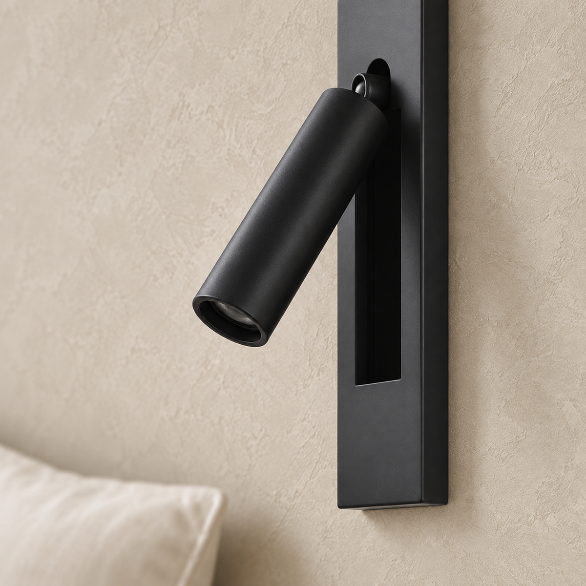 Menaliro black bedside lamp head seen close, showing the light aperture and pivot joint