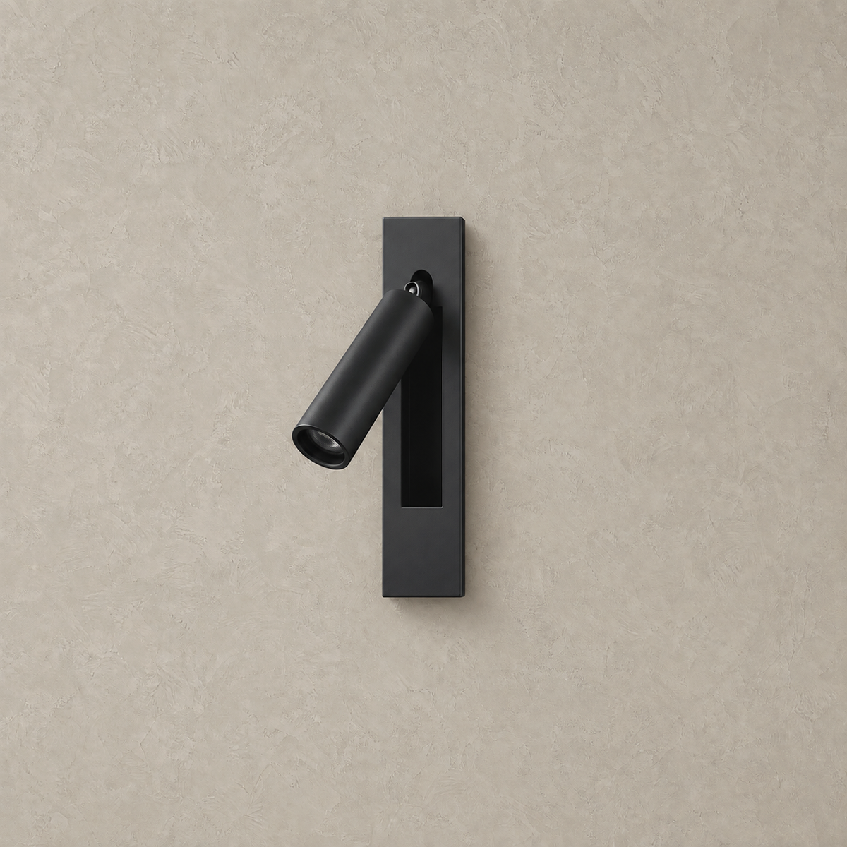 Menaliro black LED wall sconce unlit on greige plaster, adjustable head and rectangular base