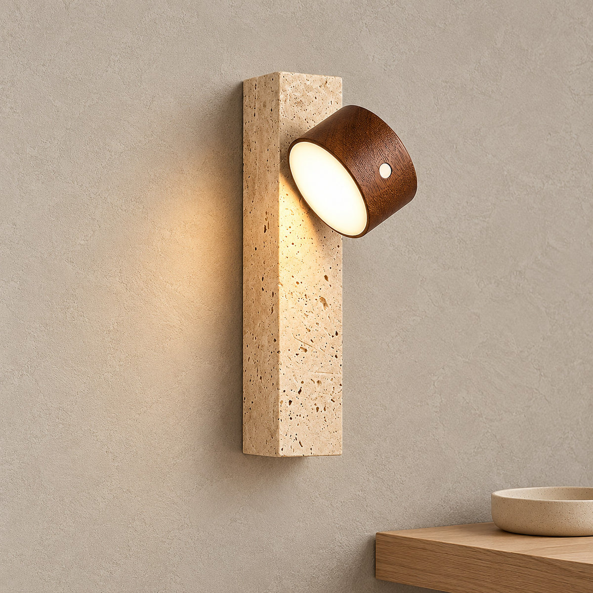 Mernavo dark wood and yellow travertine cordless wall lamp lit in a bright daytime entryway
