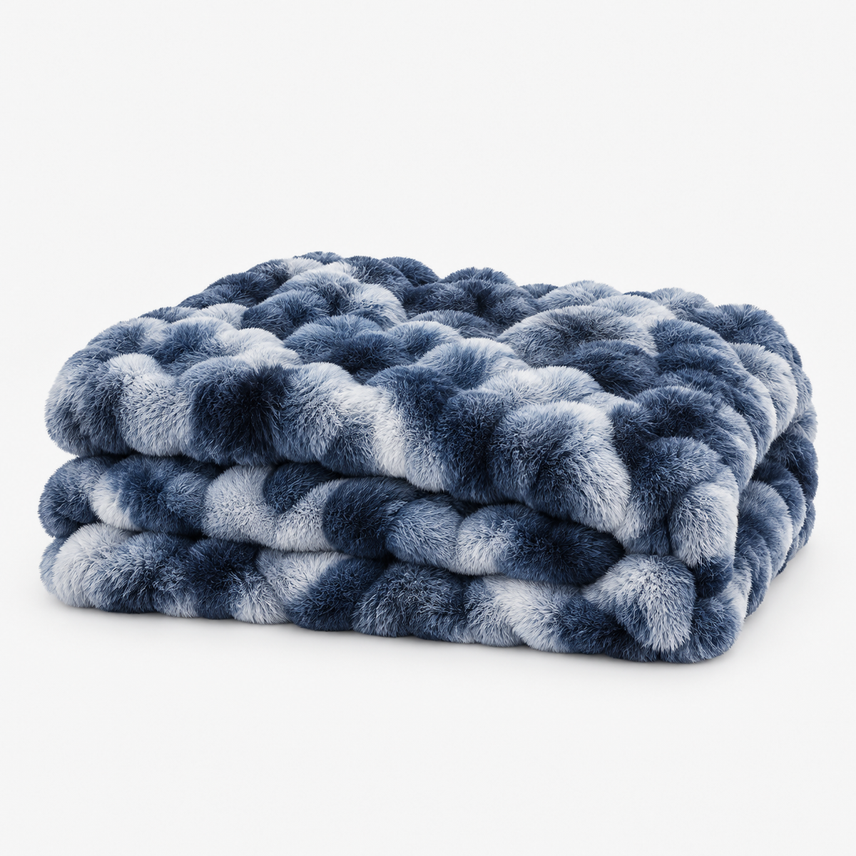 Mevorina tie dye blue faux fur throw blanket loosely folded to show its mottled bubble pile