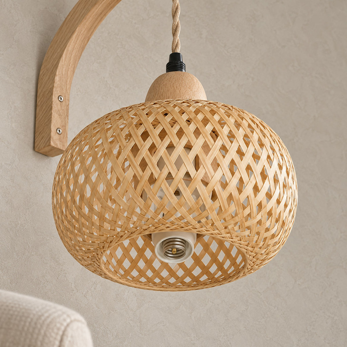 Milsoren bamboo plug in wall lamp, close view of the hand knitted weave and empty bulb socket