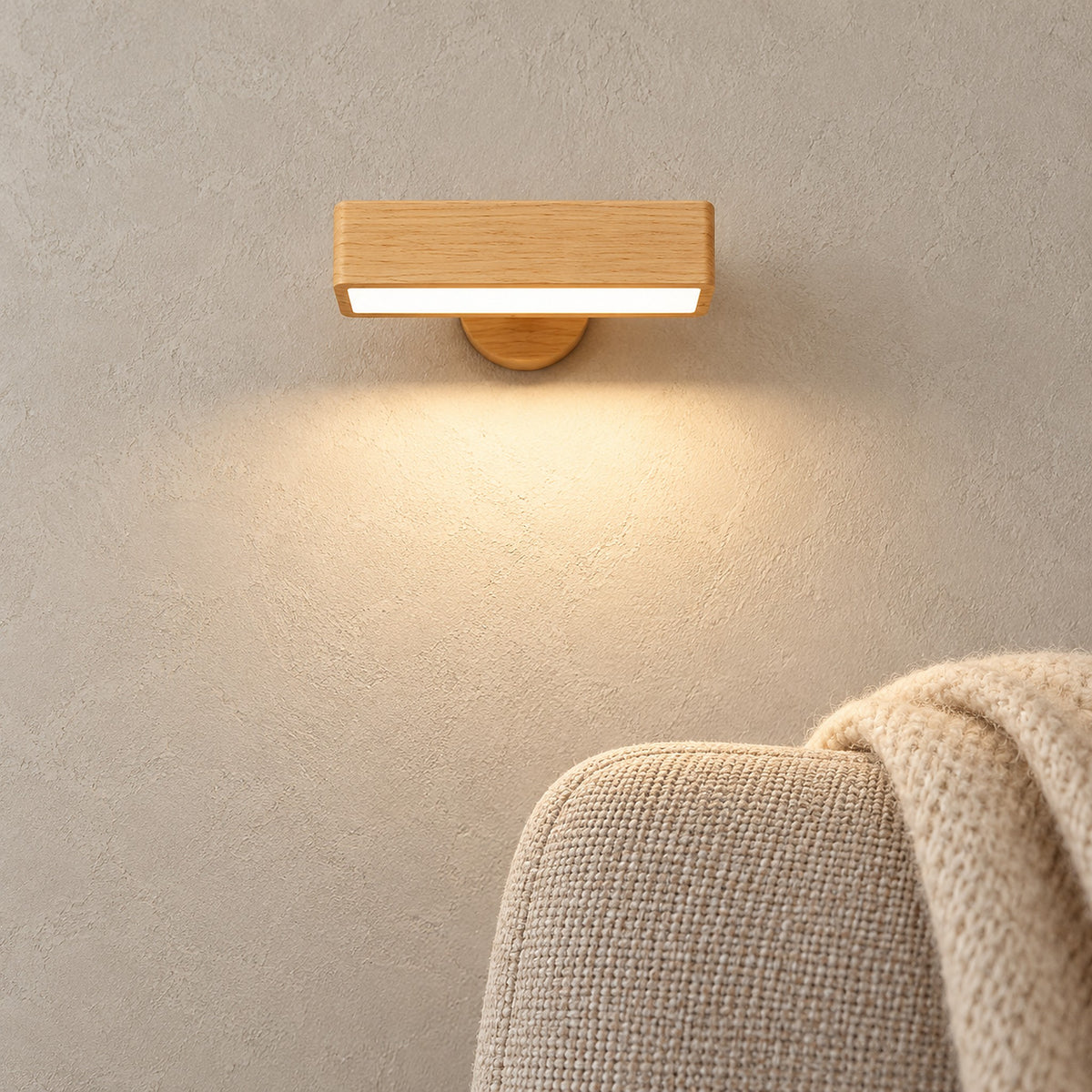 Mirsavel natural cordless wall lamp switched on beside a chair in a sunny study reading corner
