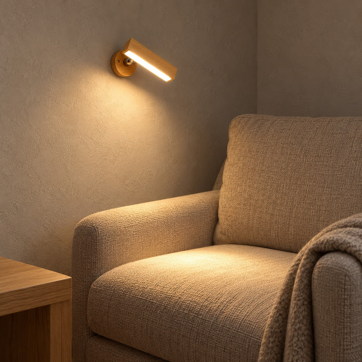 Mirsavel natural wall lamp aimed toward an armchair seat in a living room