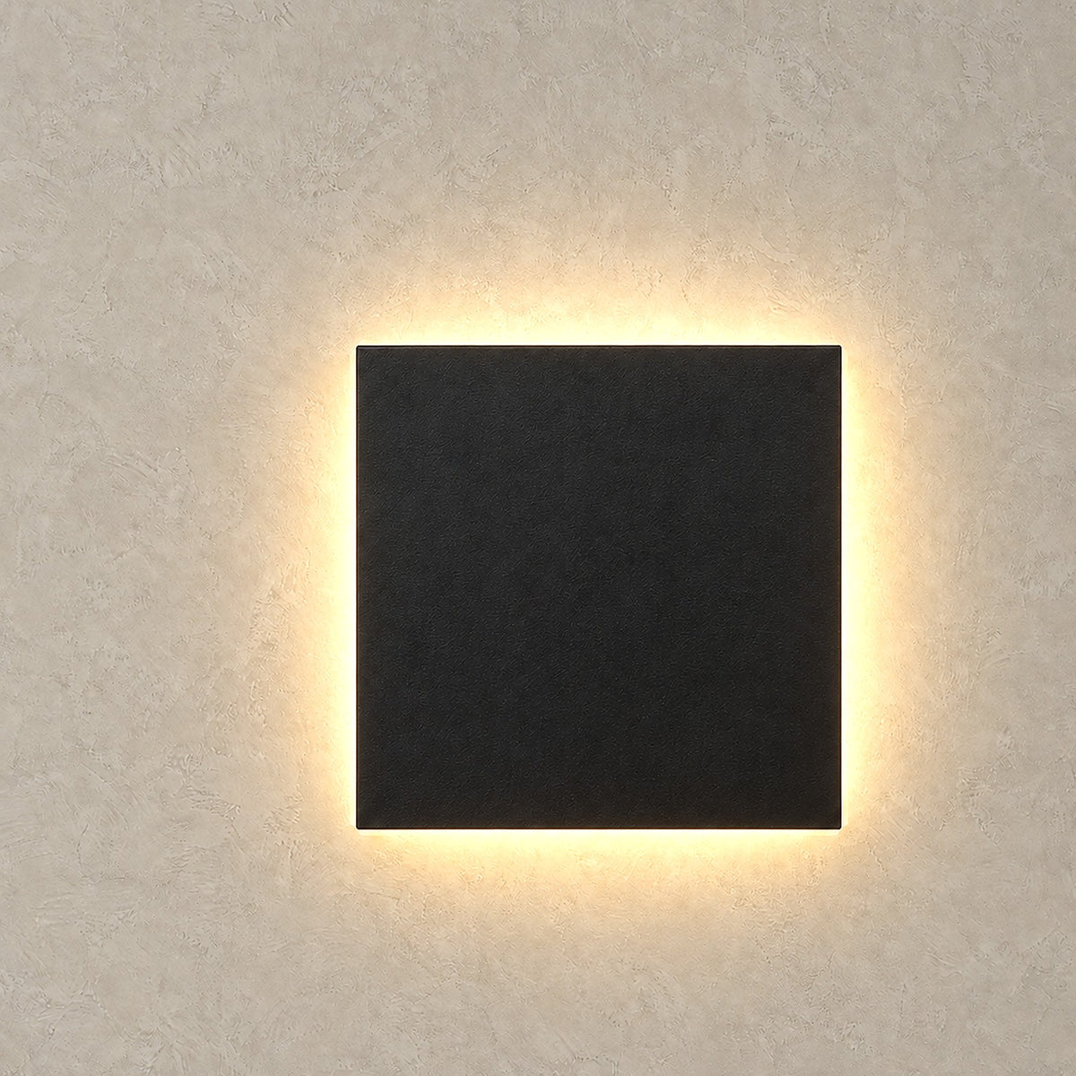 Mivorel black battery operated wall sconce with a soft halo spreading from all four sides