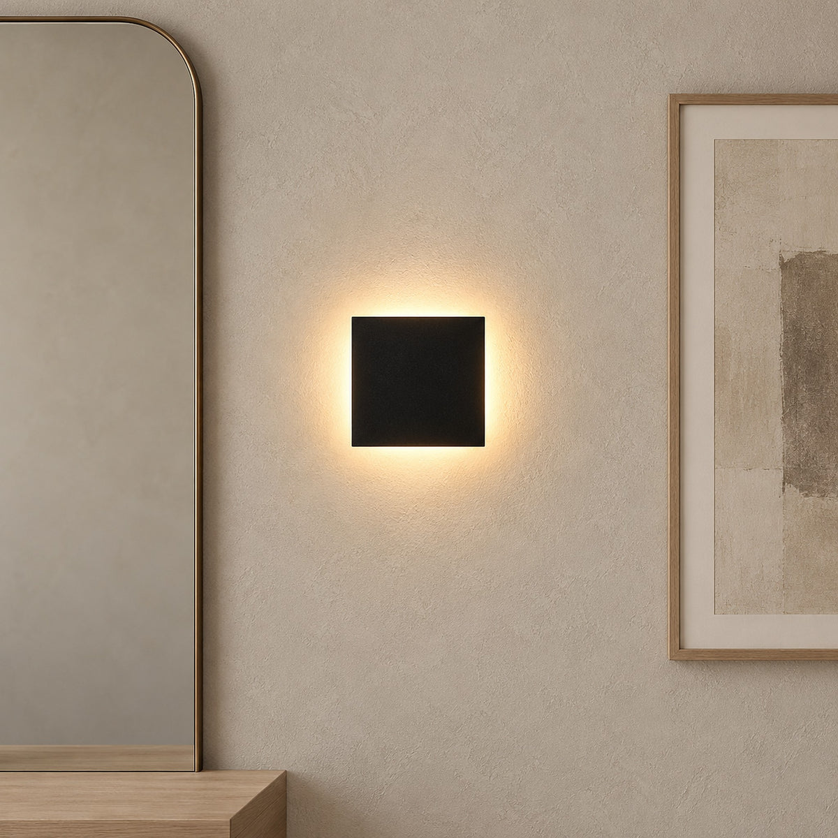 Mivorel black rechargeable wall sconce lit between framed pictures in a dressing room