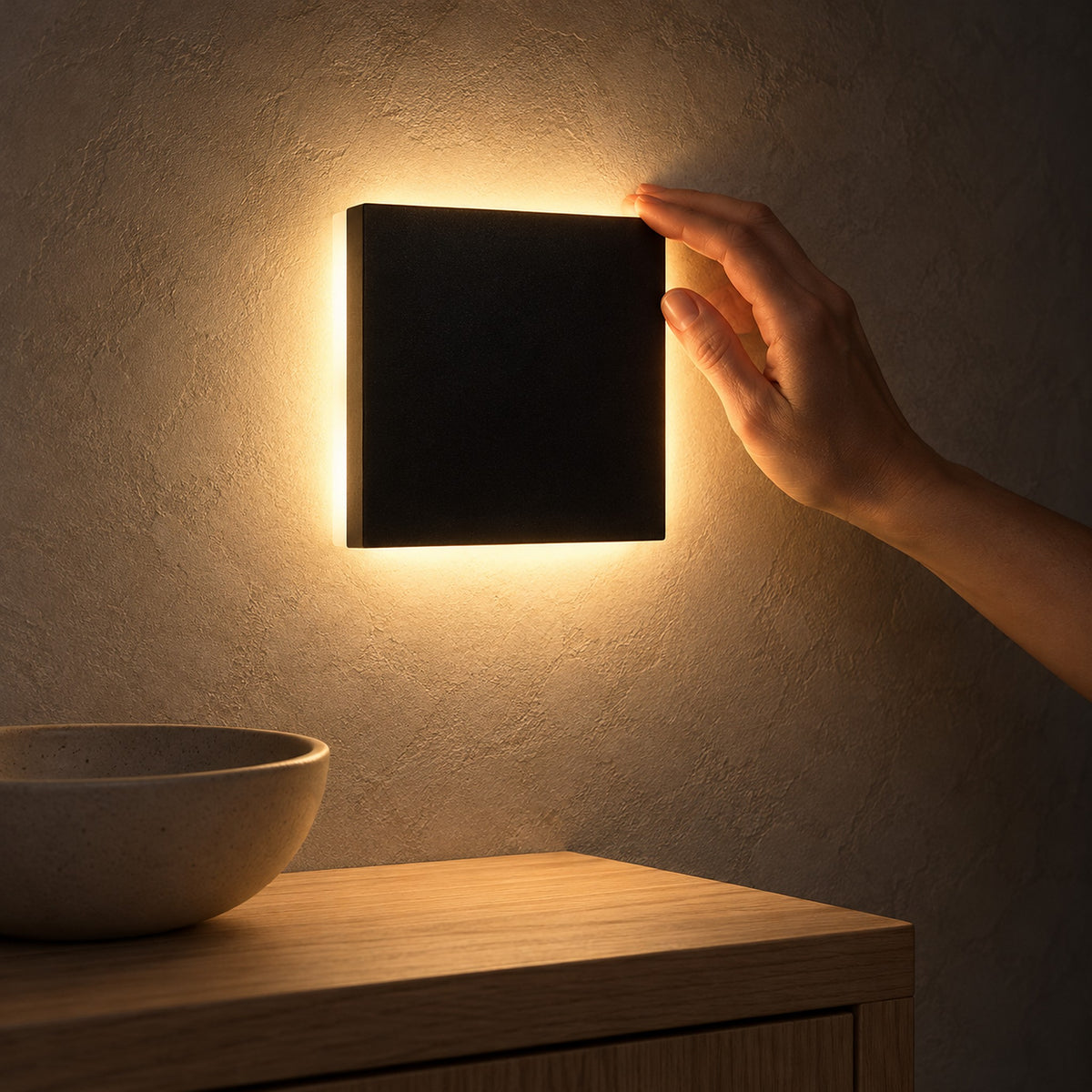 Mivorel black square cordless wall lamp casting light across a dining room at night