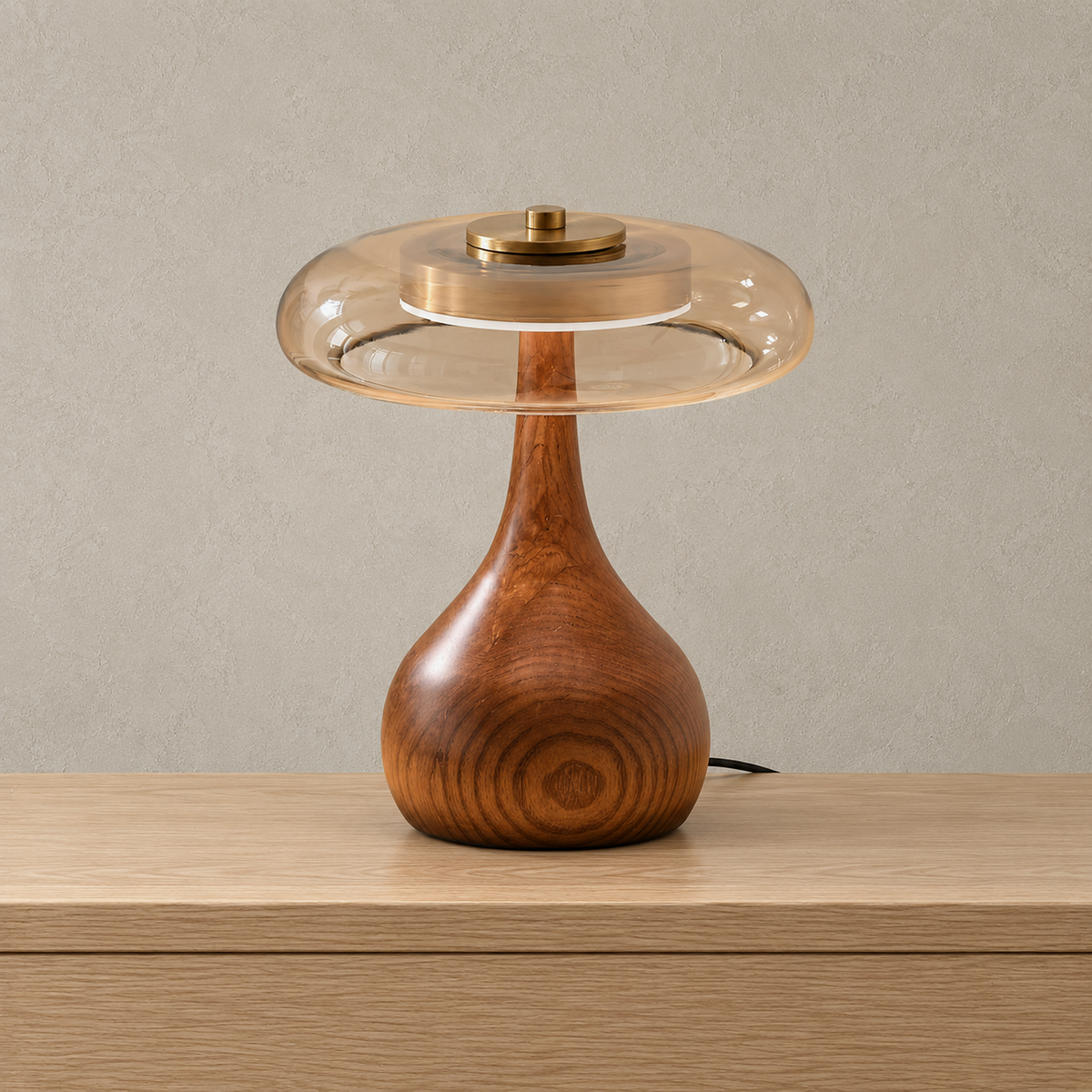 Molirea wood table lamp in brown wood and amber, shown unlit with its rounded teardrop wooden base