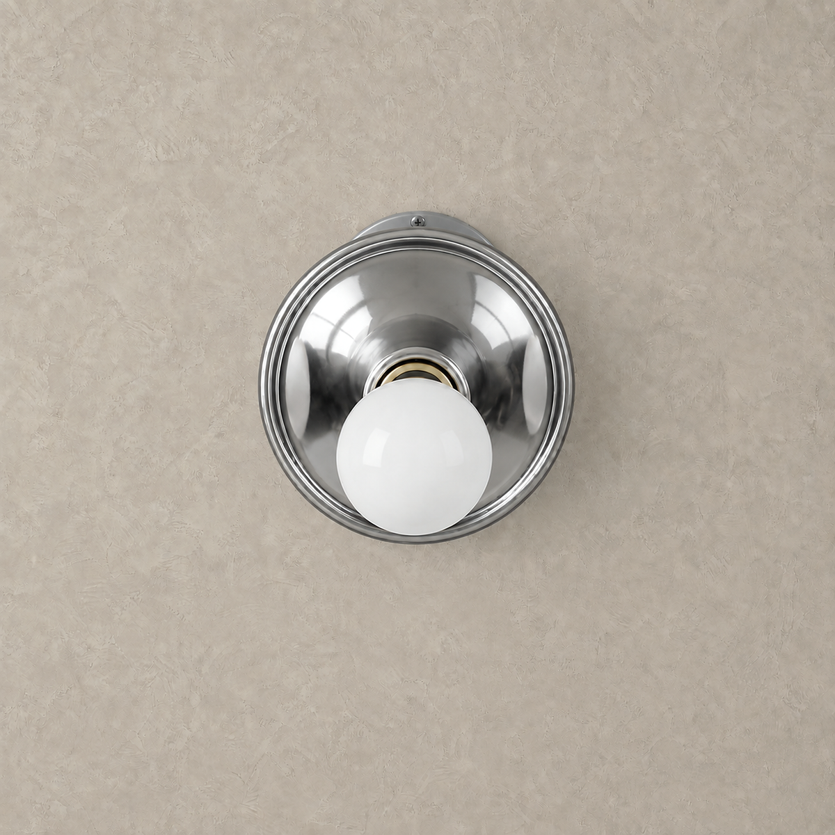 Monterla chrome plug in wall sconce unlit on plain greige plaster #color_chrome