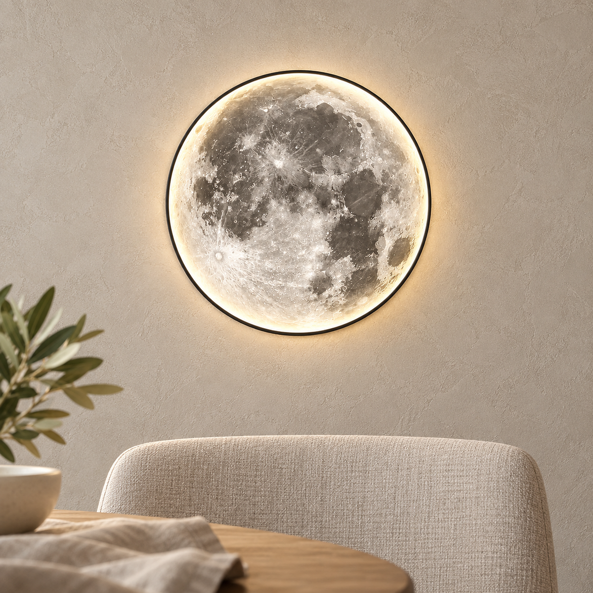 Movantel black moon wall lamp glowing beside dining room furniture in daylight