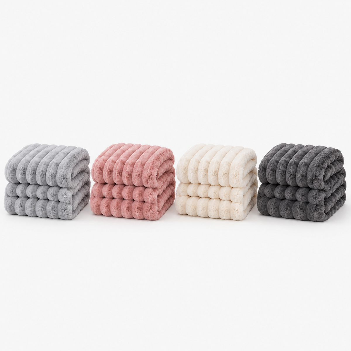Nalomira light gray, pink, ivory white and space gray plush fleece blankets folded together