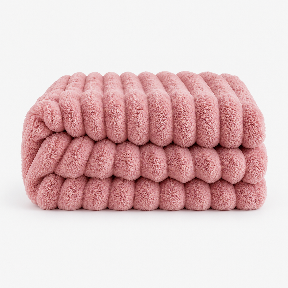 Nalorema plush fleece blanket in soft pink, loosely folded on a plain white background