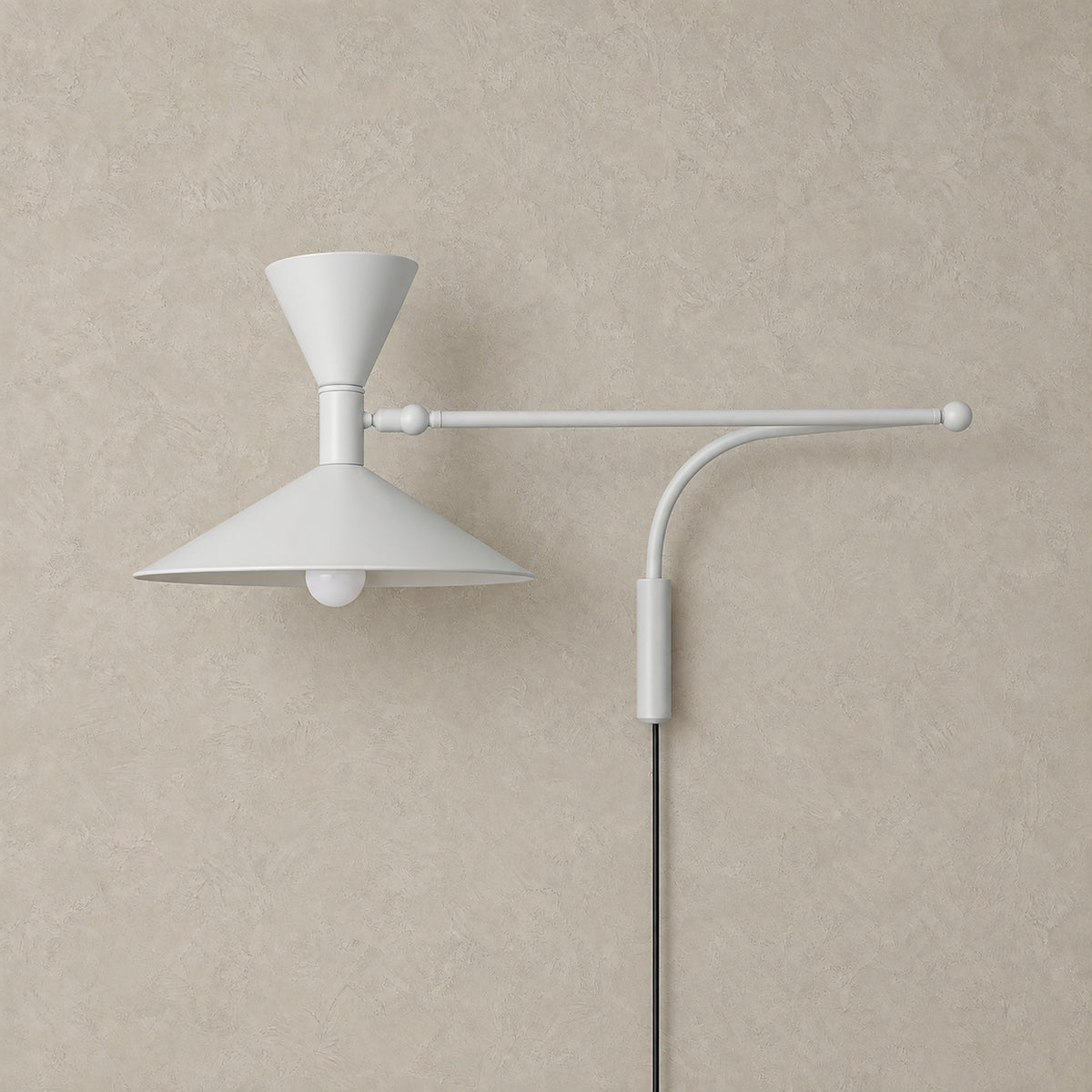 Nalveto white plug in wall sconce with a swing arm and a double cone metal shade