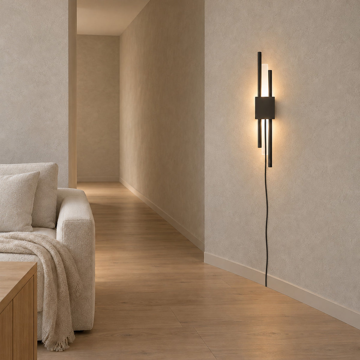 Nemirsa black plug in wall light fixed to a narrow hallway wall, leaving the floor clear