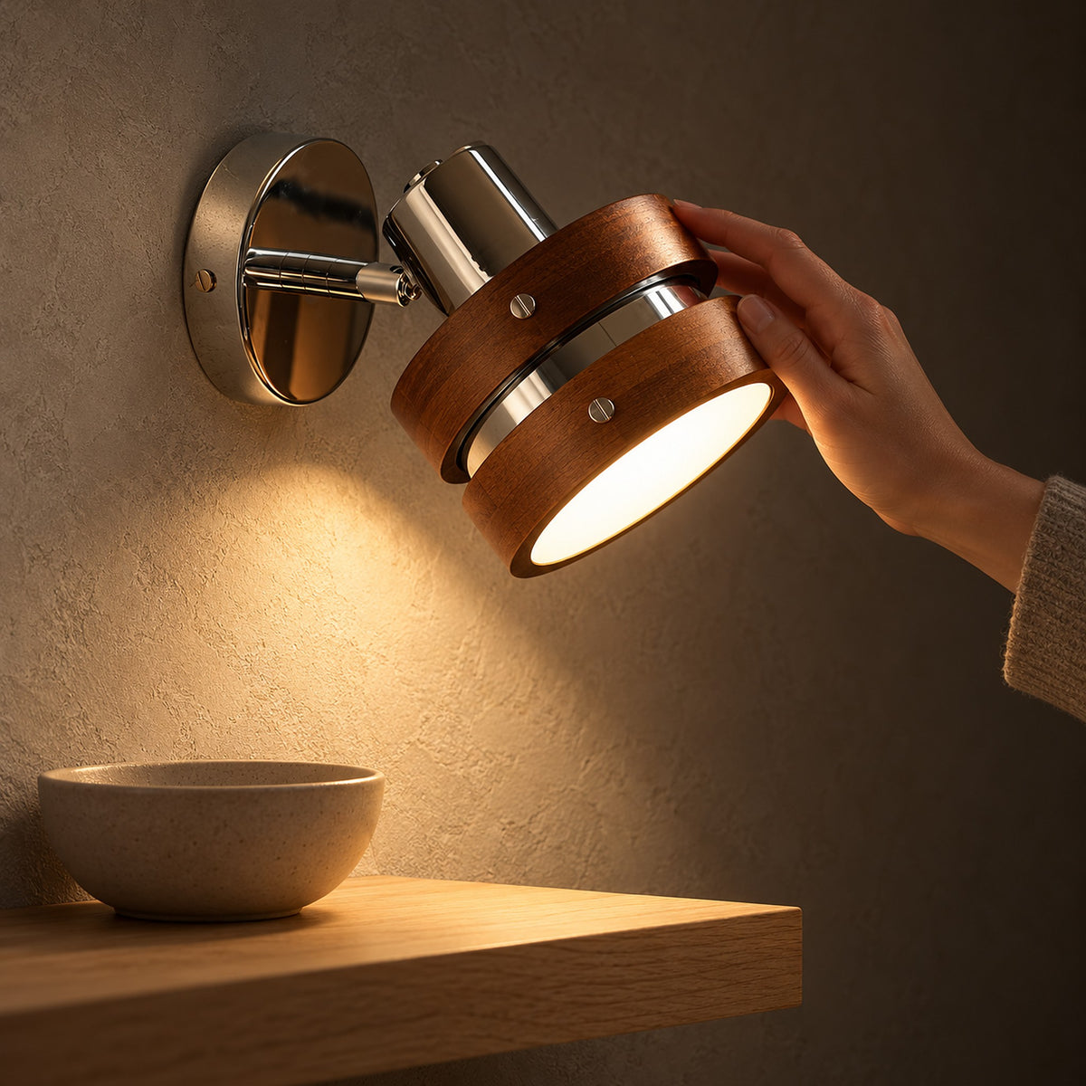 Nerilvo chrome and walnut wall lamp lighting hallway plaster at night