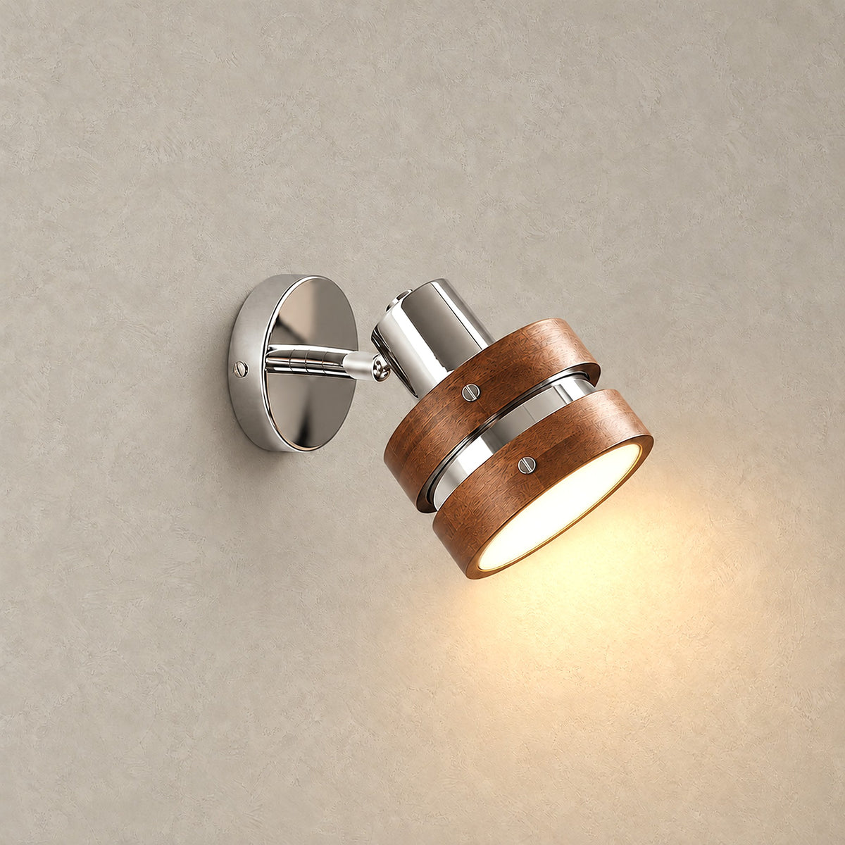 Nerilvo chrome and walnut wall sconce glowing warm against a plain backdrop