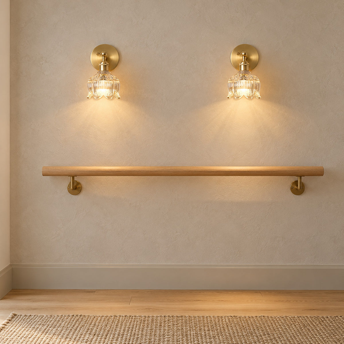 Pair of Nolavire golden cordless wall lamps lighting a stair landing during the day