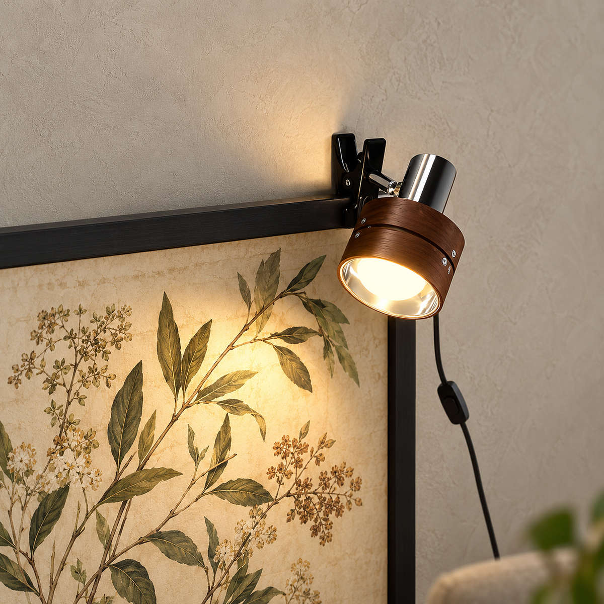 Ornalio clip on picture light in walnut and iron lighting botanical artwork in a dining room by day
