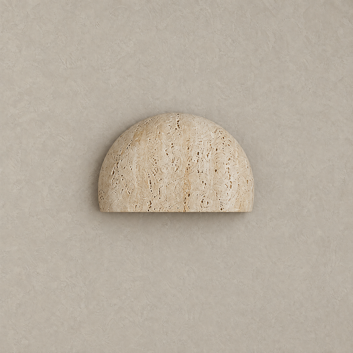 Pavolen stone hardwired wall sconce with an unlit natural travertine face shaped as a half dome