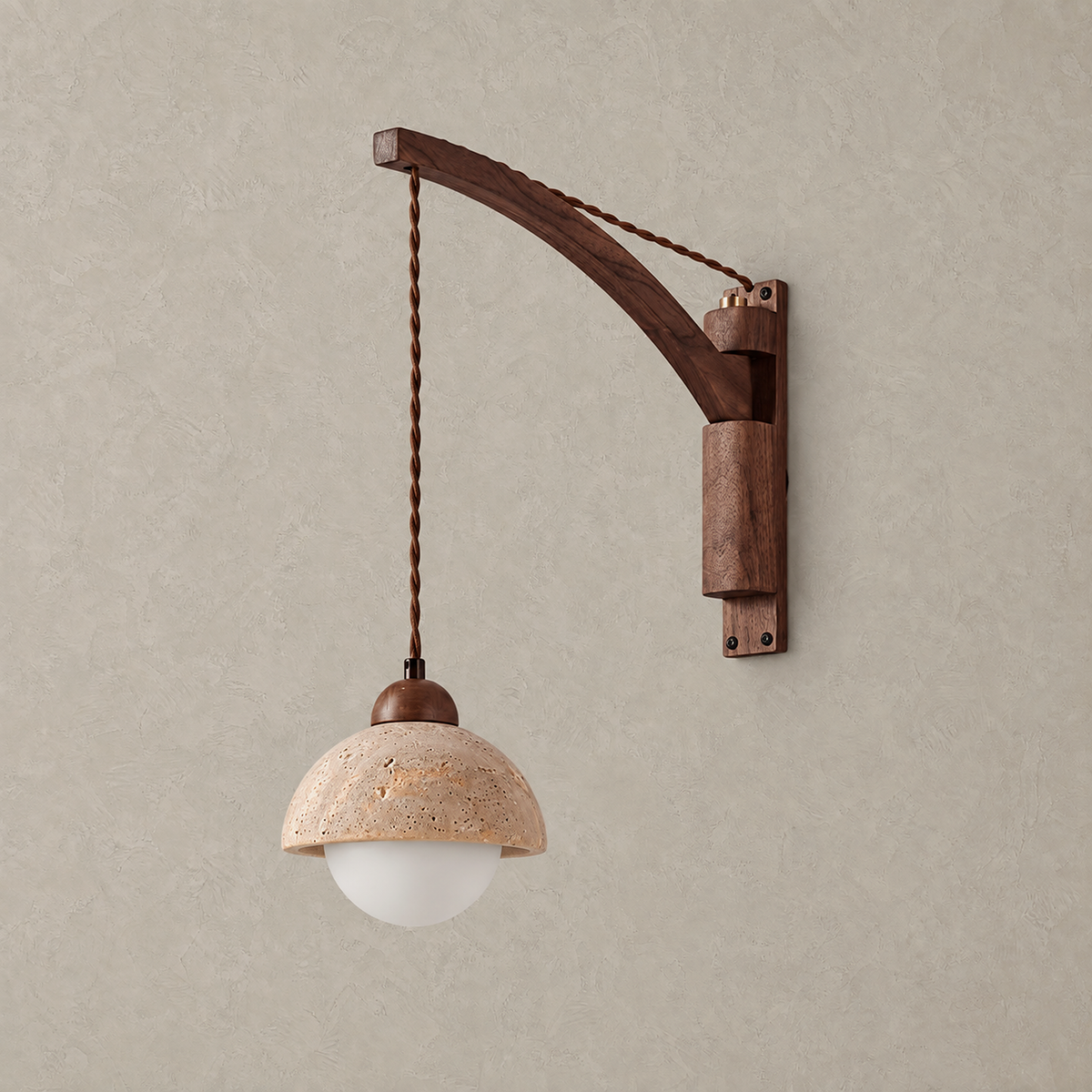 Relmino yellow travertine wall sconce switched off showing its curved arm and dome shade