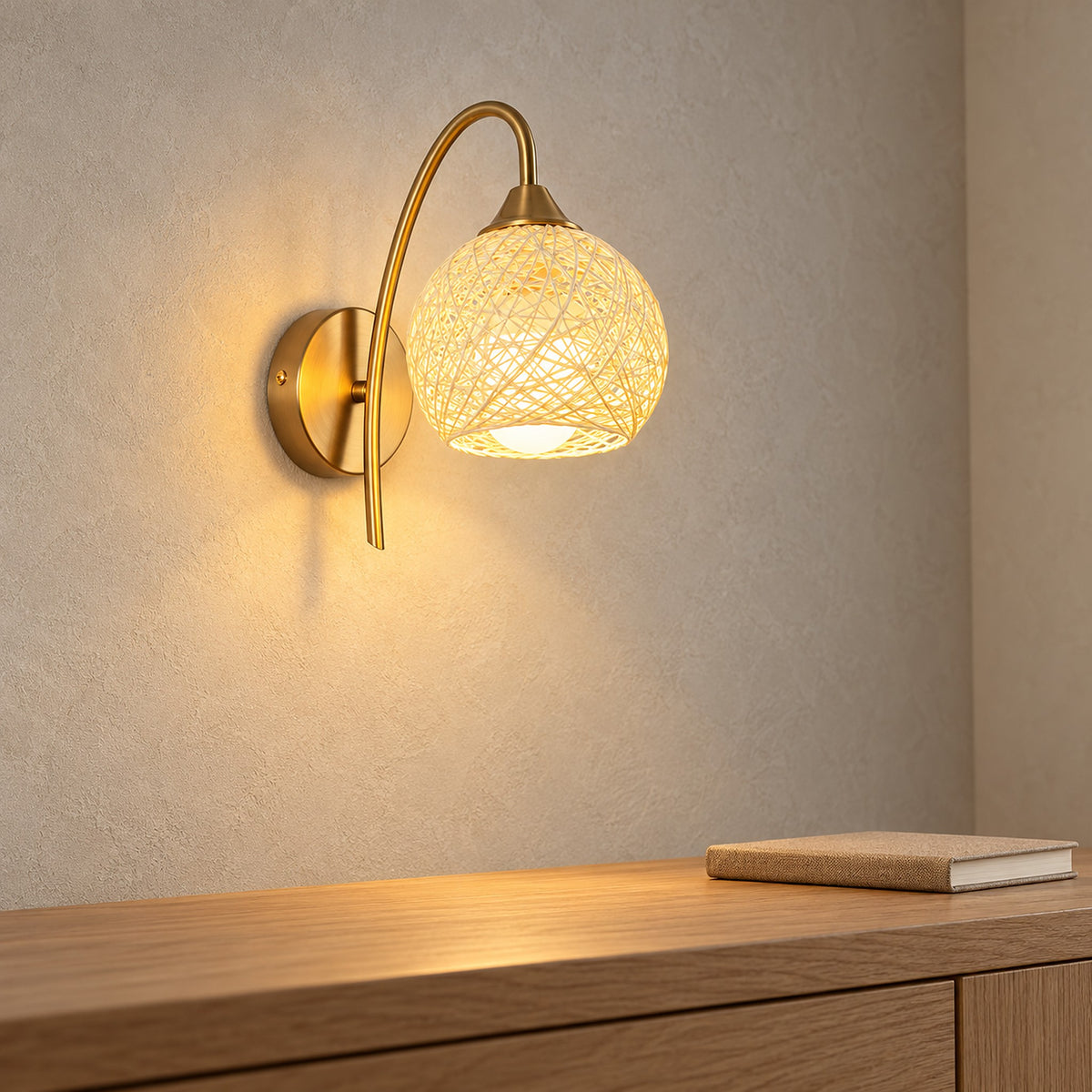 Remilvo gold battery operated wall sconce showing the included rechargeable bulb inside the shade
