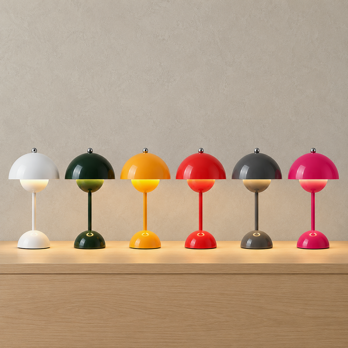 Retomira white, green, yellow, red, gray and pink table lamps lit side by side