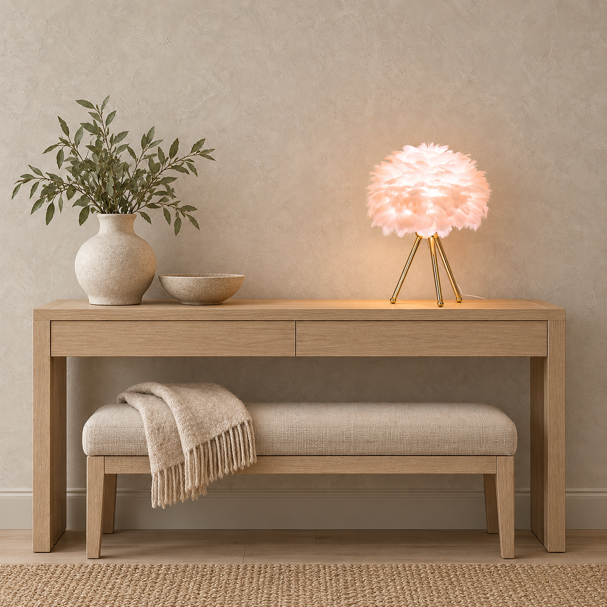 Rimolen light pink gold table lamp lit above an oatmeal bench in an entry hall by day