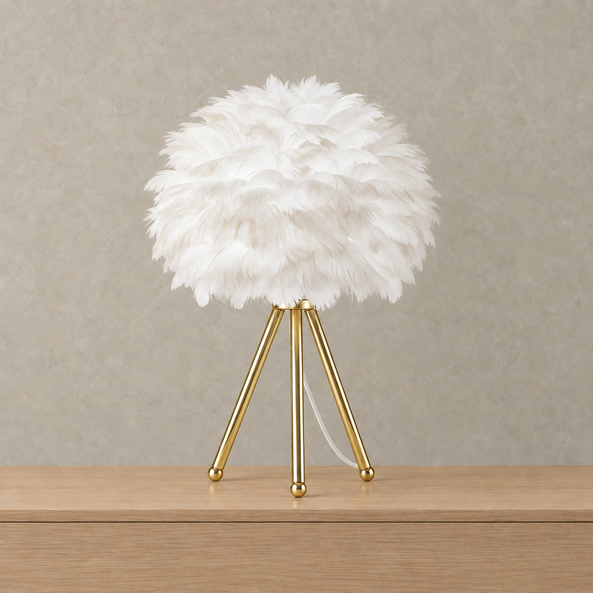 Rimolen white gold feather table lamp with unlit feather shade on an iron tripod base #color_white gold