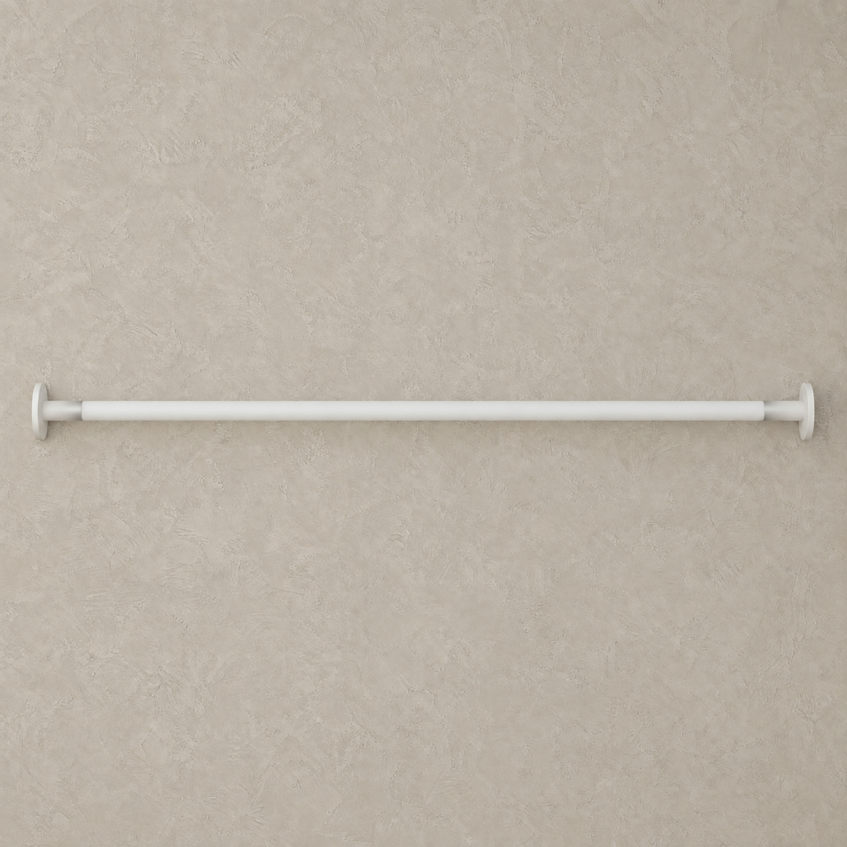 Ronelia white linear LED wall light unlit on a plain plate showing both end fittings
