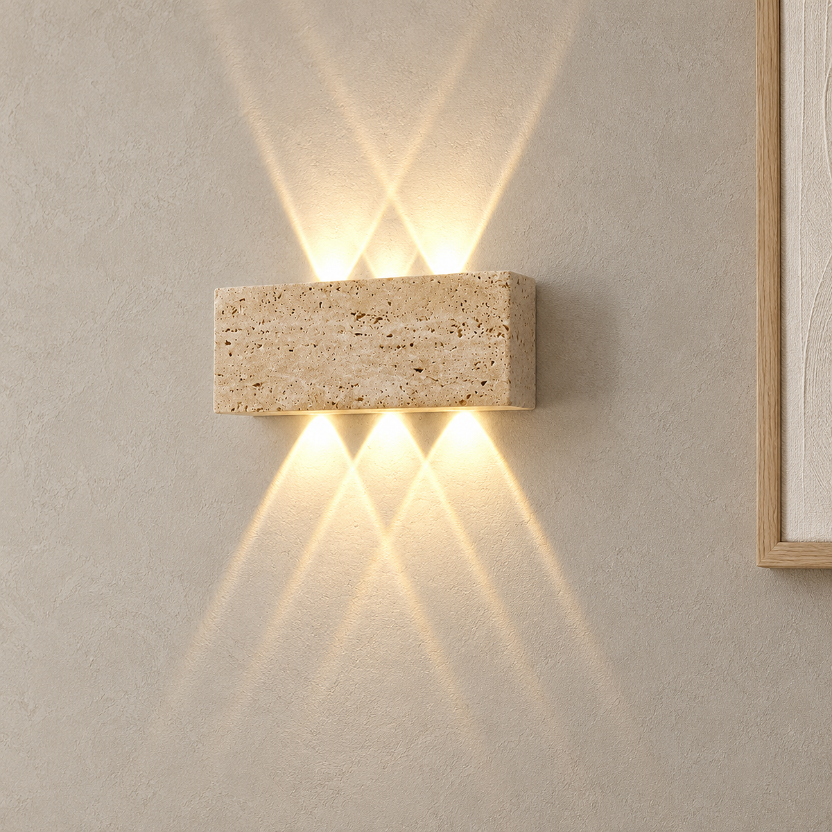 Sarivol beige stone hardwired wall light lit in an entryway, clean bare wall below the fixture