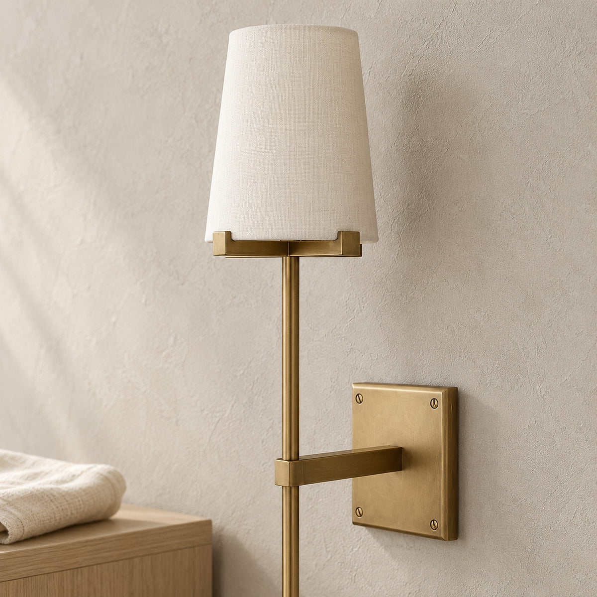 Savorel copper colored battery operated wall sconce, close view of the shade support and unlit fabric texture